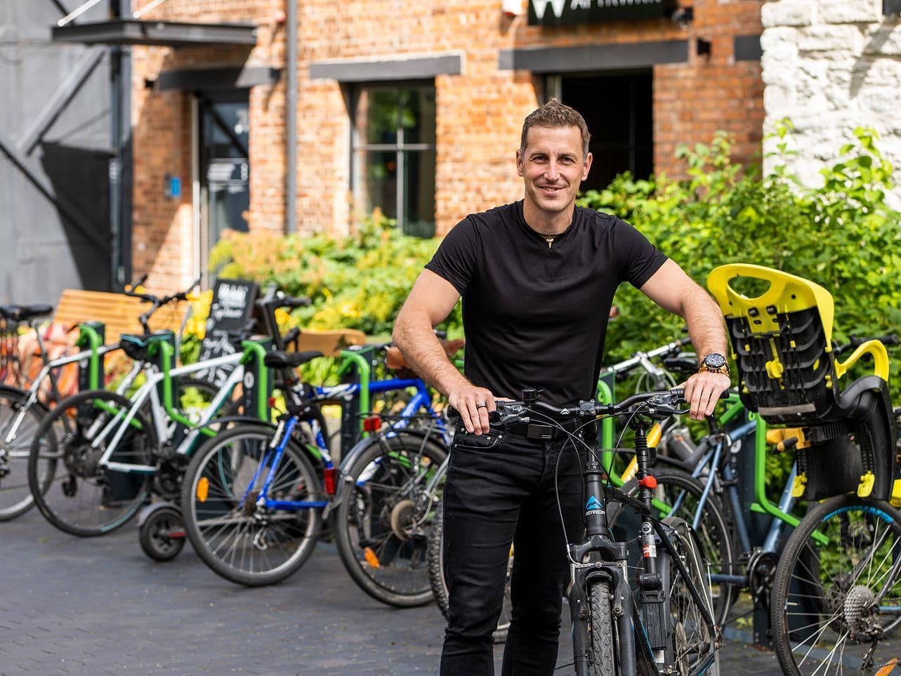 strapi-seed-1772621891259-Bikeep%20bike%20stations%20for%20smart%20cities%20easy%20and%20secure%20bike%20parking%20-%20kristjan%20lind%20in%20front%20of%20the%20station%20-%20station%20full%20-%20hero